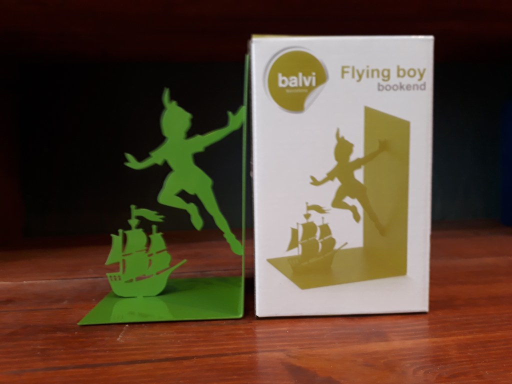 Flying boy single bookend. Green metal 12 euro